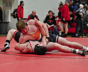 Wrestling coaches and officials react to new out of bounds rule and scoring system