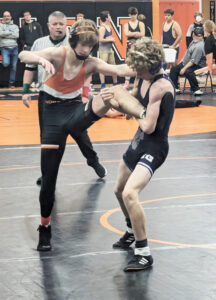 NU’s Welch wins mat title; Lady Cats compete in Highland tournament