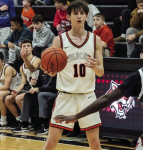 NU boys basketball squad falls to  London, topples Benjamin Logan