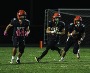 Wildcats come out on the positive side of high scoring affair against Urbana