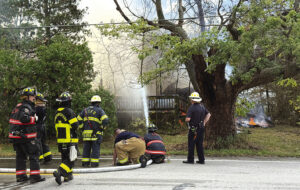 Vacant building burns down in Broadway